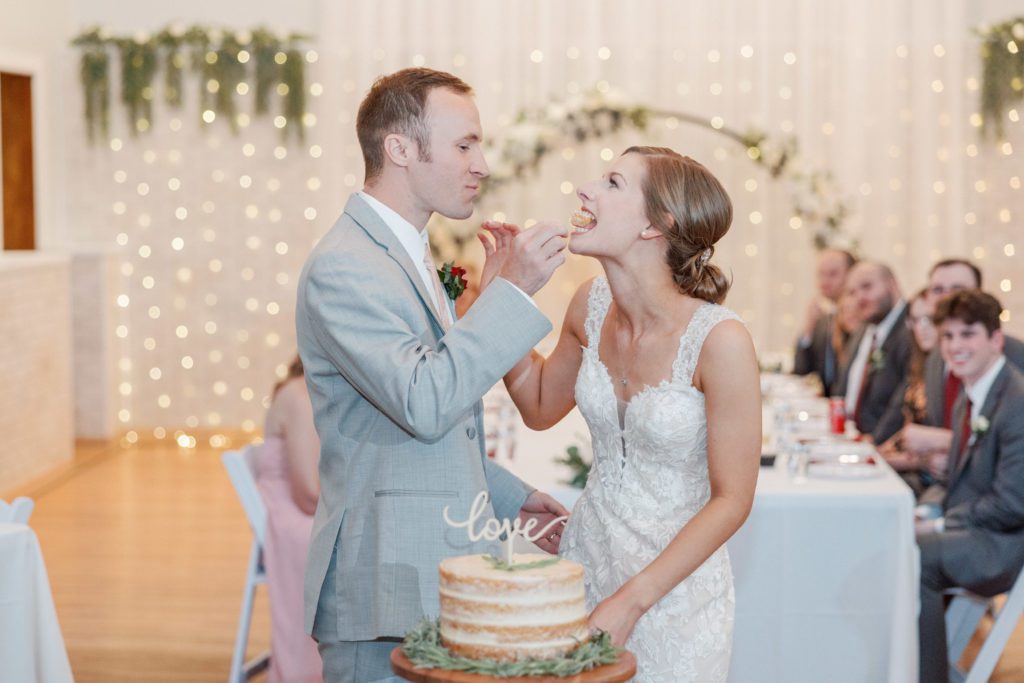 Meeker's Venue wedding cutting cake