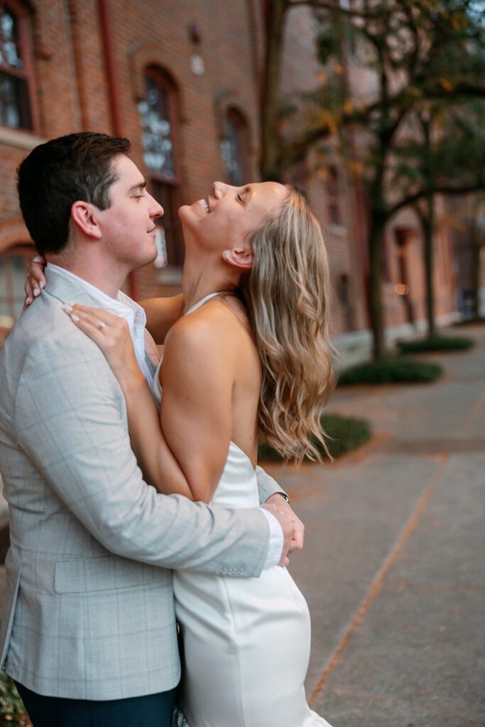 Rehearsal coverage up close bride and groom laughing