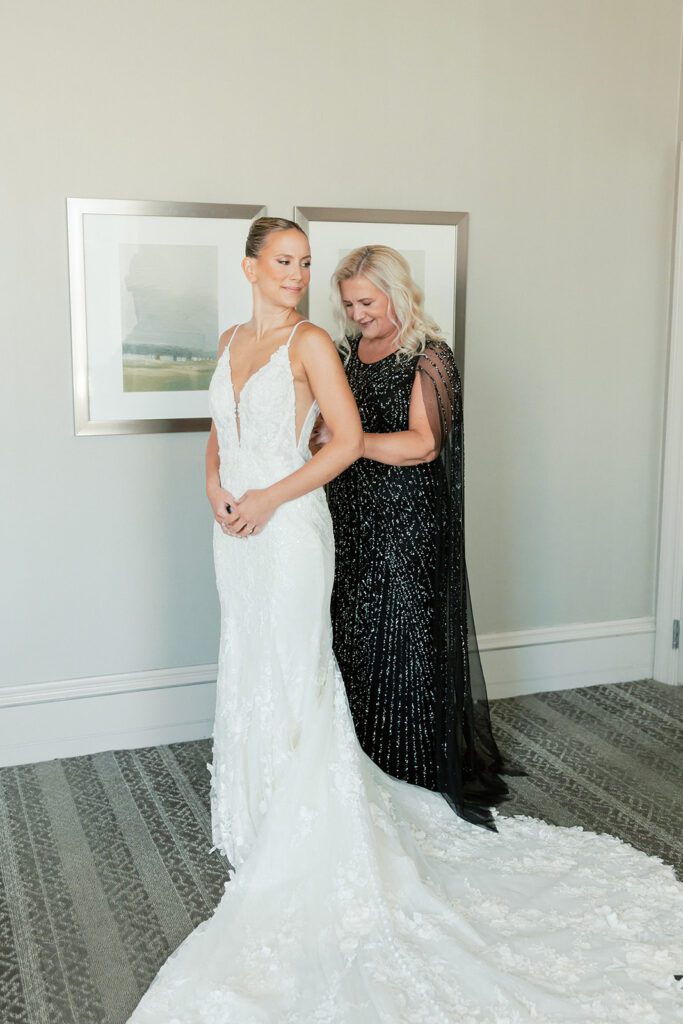 Mom helping bride